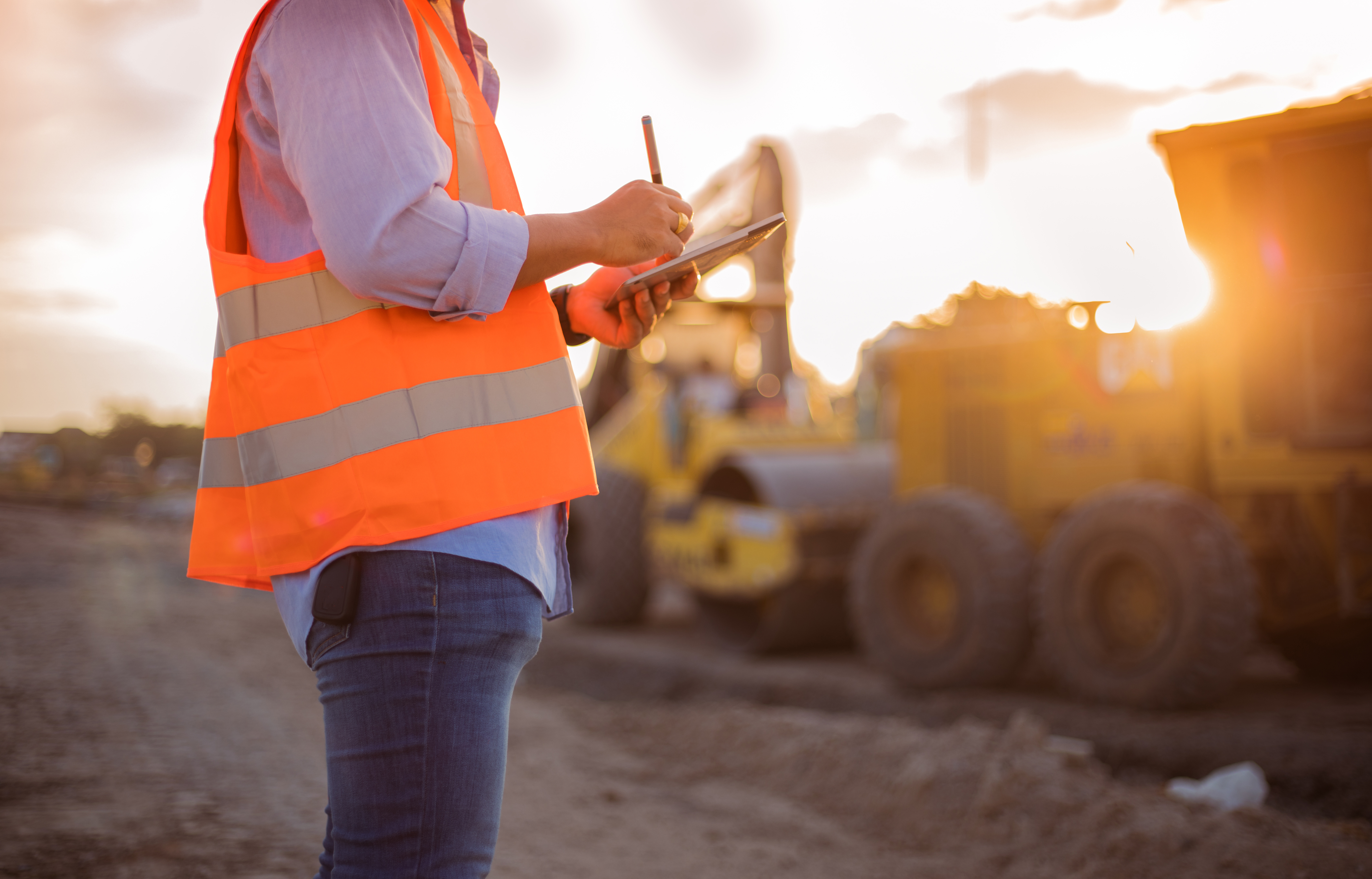 Worker in safety gear on a worksite